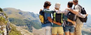 friends on top of mountain